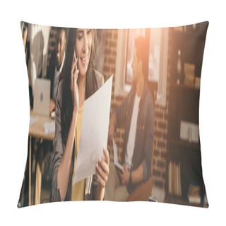 Personality  Cropped View Of Casual Businesswoman Working And Talking On Smartphone In Loft Office With Colleagues And Backlit Behind Pillow Covers