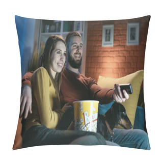 Personality  Happy Couple Relaxing On The Sofa At Home With Their Dog, They Are Watching TV Shows And Eating Popcorn, He Is Holding The Remote Control Pillow Covers