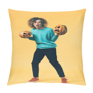 Personality  Scared Curly Teenager Holding Halloween Pumpkins On Yellow Pillow Covers