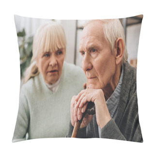 Personality  Selective Focus Of Sad Pensioner Sitting Near Senior Wife At Home  Pillow Covers