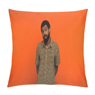 Personality  Puzzled African American Man With Beard Looking At Camera On Orange Background Pillow Covers