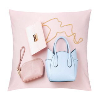 Personality  Fashion Handbags On Pale Pink Background. Flat Lay, Top View. Spring/summer Fashion Concept In Pastel Colored Pillow Covers