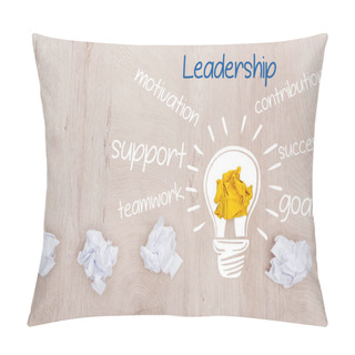 Personality  Top View Of Crumpled Paper Balls, Light Bulb And Leadership, Motivation, Contribution, Support, Success, Teamwork, Goals Word On Wooden Surface, Business Concept Pillow Covers
