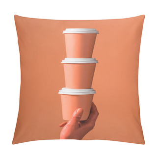 Personality  Cropped View Of Female Hand With Stack Of Coral Paper Cups On Coral Background, Color Of 2019 Concept Pillow Covers