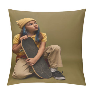 Personality  Portrait Of Trendy Preadolescent Girl With Colored Hair Wearing Yellow Hat And Urban Outfit While Holding Skateboard And Looking Away On Khaki Background, Girl With Cool Street Style Look Pillow Covers