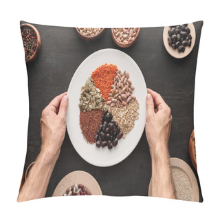Personality  Cropped View Of Man Holding White Plate With Various Raw Legumes And Cereals Near Bowls On Dark Wooden Surface Pillow Covers