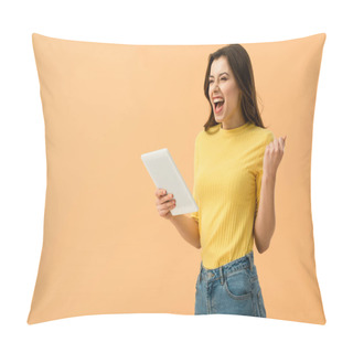 Personality  Excited Brunette Girl Holding Digital Tablet And Laughing Isolated On Orange Pillow Covers