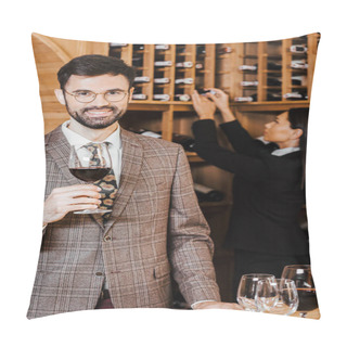 Personality  Female Wine Steward Taking Bottle From Shelf For Client While He Looking At Camera At Wine Store Pillow Covers