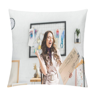 Personality  Cheerful Young Designer Gesturing While Celebrating And Holding Fashion Sketches  Pillow Covers