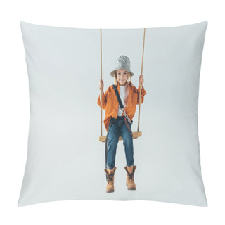 Personality  Cute Kid In Silver Hat, Jeans And Orange Shirt Sitting On Swing On Grey Background  Pillow Covers