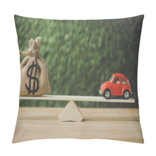 Personality  Toy Car And Money Bag With Dollar Sign Balancing On Seesaw On Green Background Pillow Covers