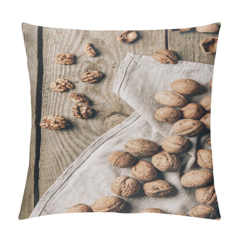 Personality  top view of delicious organic walnuts and cloth on wooden table pillow covers