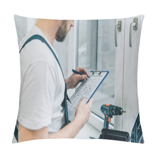 Personality  Cropped Shot Of Male Handyman Writing In Clipboard And Checking Window  Pillow Covers