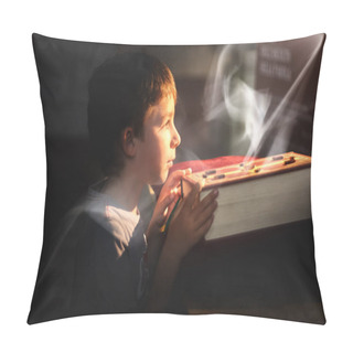 Personality  Redhaired Boy Looks At A Magic Book Over Which A Cloud Of Ghost-shaped Smoke Rises. Selective Focus. Fantasy. Pillow Covers