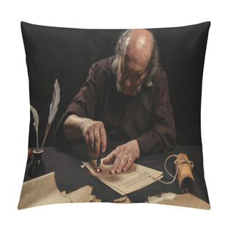 Personality  Senior Monk Stamping Manuscript With Wax Seal Near Parchments Isolated On Black Pillow Covers