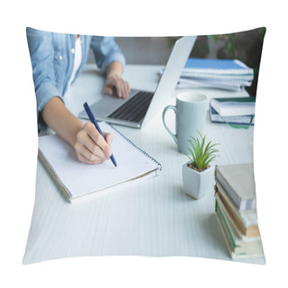 Personality  Cropped View Of Woman Making Notes In Notebook And Typing On Laptop Pillow Covers