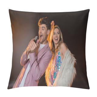 Personality  Man Singing While Holding Microphone Near Happy Blonde Woman On Black Pillow Covers