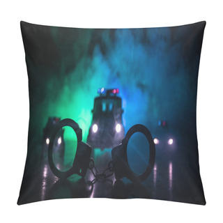 Personality  Police Raid At Night And You Are Under Arrest Concept. Silhouette Of Handcuffs With Police Car On Backside. Image With The Flashing Red And Blue Police Lights At Foggy Background. Slider Shot Pillow Covers