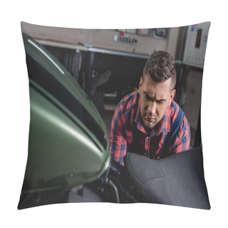 Personality  Young Repairman Checking Motorbike In Workshop On Blurred Foreground Pillow Covers