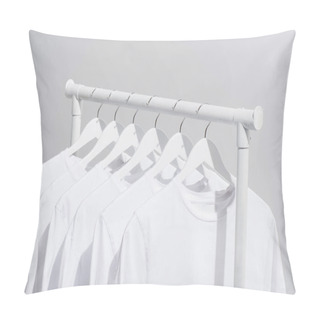 Personality  Collection Of Trendy White T-shirts Hanging On Clothes Rack Isolated On Grey  Pillow Covers