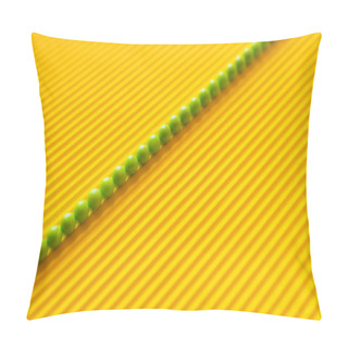 Personality  Top View Of Diagonal Line Of Small Green Balls On Yellow Corrugated Background Pillow Covers