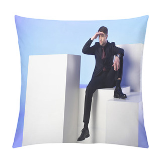 Personality  Businessman In Black Suit Sitting On White Block And Looking Away Isolated On Blue Pillow Covers