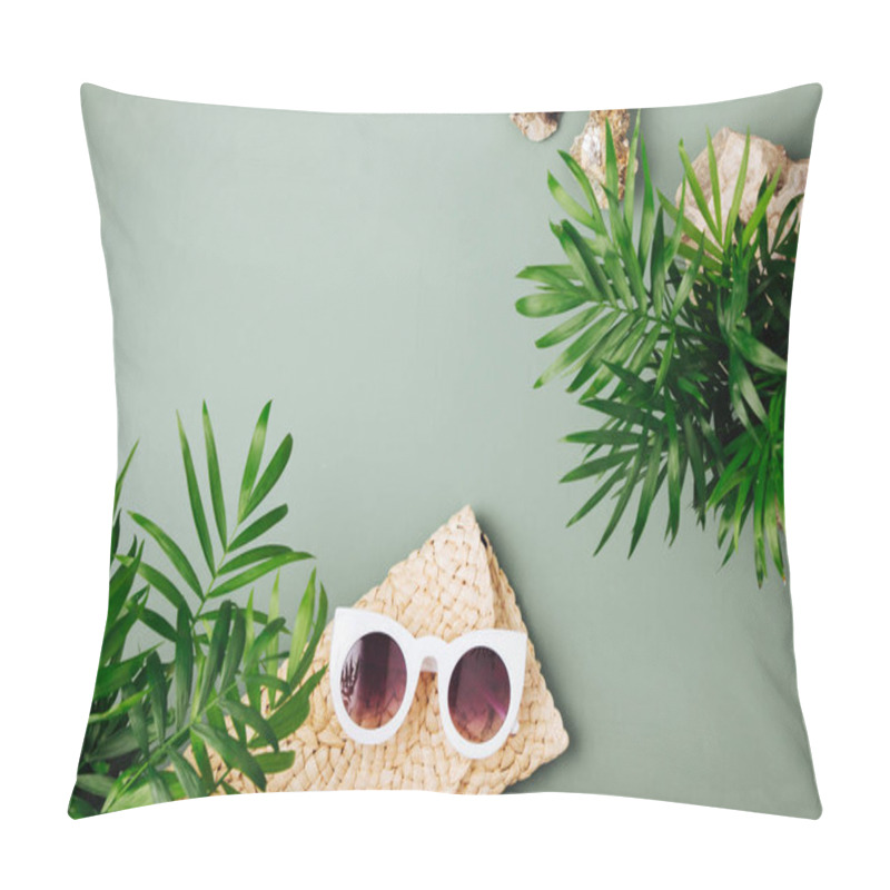 Personality  Tropical leaves and Beach bag with sunglasses  on  green  background. Top view, flat lay. pillow covers