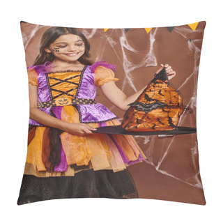 Personality  Cheerful Kid In Halloween Witch Costume Holding Pointed Hat On Brown Background, Spooky Season Pillow Covers