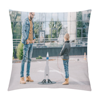 Personality  Father Looking At Little Son Launching Model Rocket Outdoor Pillow Covers