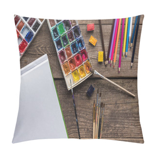 Personality  Top View Of Colorful Paint Palettes, Paintbrushes, Color Pencils And Blank Sketch Pad On Wooden Surface Pillow Covers
