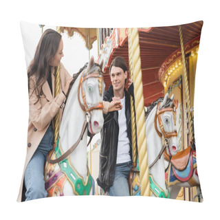 Personality  Cheerful Young Couple In Stylish Outfits Holding Hands And Riding Carousel Horses In Amusement Park Pillow Covers