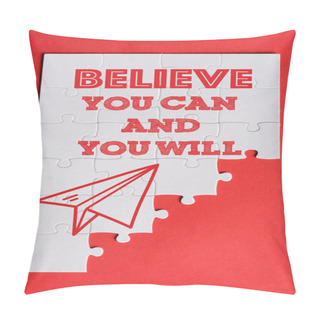 Personality  Top View Of White Connected Puzzle Pieces With Paper Plane And Believe You Can And You Will Lettering Isolated On Red  Pillow Covers