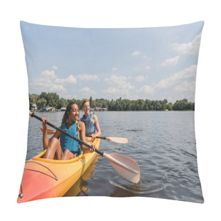 Personality  Carefree And Charming African American Woman And Young Redhead Man In Life Vests Sailing In Sportive Kayak On Calm Water Surface Under Blue Sky With Clouds On Summer Day Pillow Covers