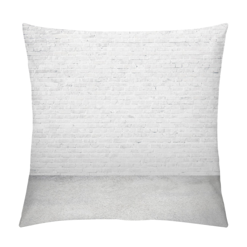 Personality  interior room with white brick wall and floor pillow covers