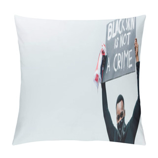 Personality  Panoramic Shot Of African American Man Holding Placard With Black Skin Is Not A Crime Lettering While Looking At Camera Pillow Covers