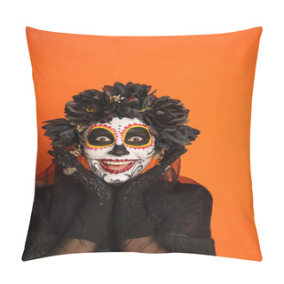 Personality  Excited Woman In Spooky Halloween Makeup And Black Wreath Holding Hands Near Face And Looking At Camera Isolated On Orange Pillow Covers