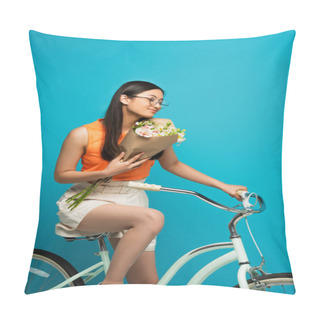 Personality  Beautiful Asian Girl In Glasses Riding Bicycle And Holding Flowers Isolated On Blue Pillow Covers