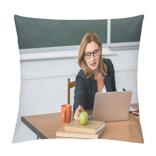 Personality  Beautiful Female Teacher In Glasses Sitting At Computer Desk And Reaching For Apple In Classroom Pillow Covers