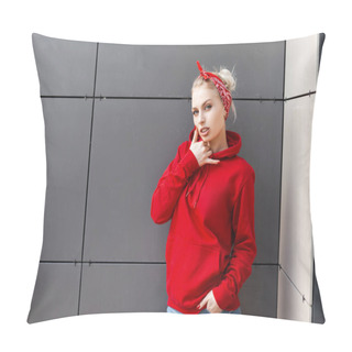 Personality  Sensual Sexy Young Blonde Woman In A Vintage Bandana In A Red Stylish Sweatshirt In Blue Jeans Posing Outdoors Near A Gray Wall On A Summer Day. American Beautiful Fashion Model Enjoys The Rest. Pillow Covers