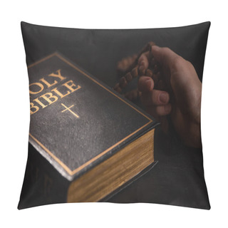 Personality  Cropped View Of Woman Holding Rosary Near Holy Bible In Dark With Sunlight Pillow Covers