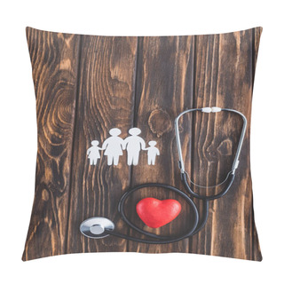 Personality  Top View Of White Figures Of Family Holding Hands, Red Heart Symbol And Stethoscope On Wooden Table Pillow Covers