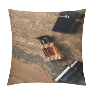 Personality  Top View Of Bottled Perfumes On Brown Weathered Surface   Pillow Covers