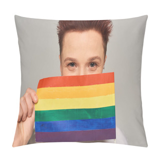 Personality  Joyful Redhead Queer Person Obscuring Face With Small LGBT Flag And Looking At Camera On Grey Pillow Covers