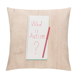 Personality  Top View Of Red Marker And What Is Autism Question Written In Notebook On Wooden Table Pillow Covers