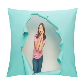 Personality  Shocked Preteen Girl In Pink T-shirt Looking At Camera During International Children Day Celebration While Standing Behind Hole In Blue Paper Background Pillow Covers