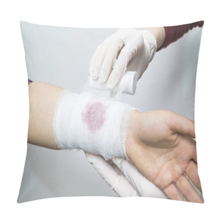 Personality  Bandaging A Bleeding Injury On The Forearm Using A White Bandage Pillow Covers