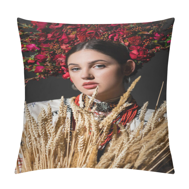 Personality  portrait of brunette ukrainan woman in floral wreath with red berries near wheat spikelets isolated on black pillow covers