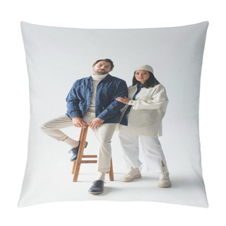 Personality  Man In Blue Jacket Sitting On High Stool Neat Trendy Asian Woman On Grey Pillow Covers