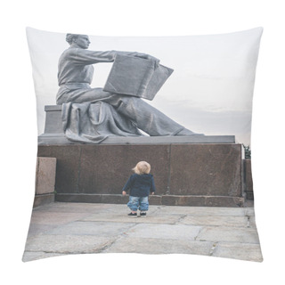 Personality  A Little Girl Stands In Front Of A Soviet Monument Depicting A Man Reading An Open Book. Pillow Covers