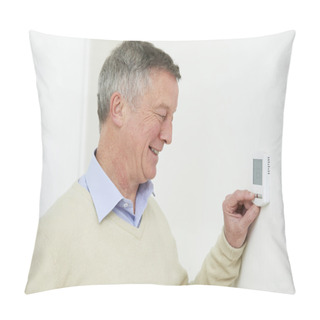 Personality  Senior Man Adjusting Central Heating Thermostat Pillow Covers